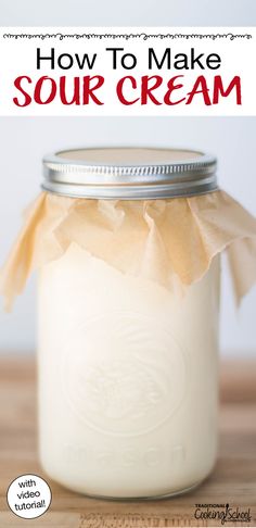 a mason jar filled with sour cream and the words how to make sour cream on it