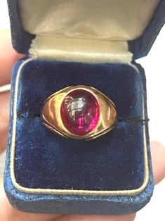 Beautiful Vintage 14k Gold Red Spinel Ring in a cabochon shape. It is hallmarked 14k.  Weight: 8.34  grams Ring US size: 6 1/4  (it can be resized upon request)  Very good antique conditions. Thank you for visiting Boudoir Vintage!   Please feel free to contact me for further information or photos.  I offer international shipping. Your item will be packed with extreme care and will be shipped within 3-5 working days. If you are dissatisfied with your item, please feel free to contact me and would be happy to assist.  If you are interested in paying in installments or reserve an item, please send me an inquiry. To continue visiting my shop, please visit  https://www.etsy.com/shop/BoudoirVintageBijoux/ FOLLOW ME on Instagram: https://www.instagram.com/boudoir_vintage/ Red Spinel Ring, Red Spinel, Spinel Ring, Cabochon Ring, Rings Statement, Red Gold, Statement Rings, Jewelry Rings, Size 6