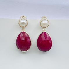 Welcome To Our Little Shop 925 Sterling Ruby And Pearl Earring  will make your look fashionable and classy. Its classy shine and flawless finish enhances its majestic charm and makes it more adorable. Handmade Earring  Gemstone : Ruby And Pearl Metal Purity : 925 Sterling Silver Main Stone Creation : Natural *Benefits Of Wearing Silver As a metal, silver has significant health benefits that have been used across cultures for centuries. Silver has a proven track record as a powerful antimicrobial Ruby And Pearl, Sterling Ruby, Handmade Earring, Gold Diamond Jewelry, Bohemian Earrings, Ruby Gemstone, Silver Earring, 925 Sterling Silver Earrings, Earring Gifts