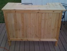 a wooden box sitting on top of a deck