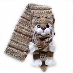 a knitted scarf with a cat on it