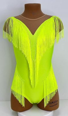 a mannequin with neon yellow fringes on it's chest and back