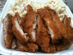 chicken and mashed potatoes in a styrofoam container