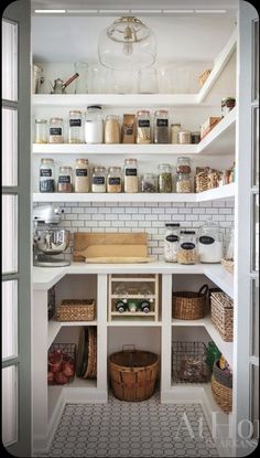 an open pantry with lots of food in it