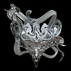 an intricately designed glass sculpture is shown in the shape of a bull's head