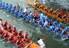 a group of people on boats in the water