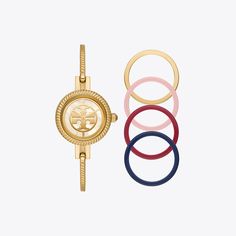 Named after Tory’s mother, the Reva is defined by an iconic Double T logo dial. Featuring five interchangeable top rings in four colors, it has an octagonal crown for a subtle signature geometric touch. The slim bracelet has a fold-over clasp to keep the watch secure and comfortable around the wrist. Search History, Tory Burch Watch, Cute Watches, Womens Designer Watches, Gold Watches, A T, T Logo, 2024 Wishlist, Bangle Watches