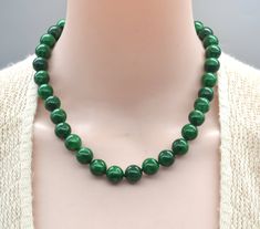 The necklace with 12mm dark green jade color: dyed dark green Necklace length: select  dark green Jade beads necklace,round, dark green Jade beads,12mm Jade beads, gemstone Wedding Jewelry,gift,big bead necklace,choker necklace The necklace will come in a beautiful gift box. I will provide a gift box for each jewelry. If you have any questions, Please feel free to contact me. Cheap Polished Jade Beaded Necklace, Turquoise Statement Jewelry, Big Bead Necklace, Red Agate Necklace, Chunky Turquoise Necklace, Pink Stone Necklace, Jade Bead Necklace, Gemstone Wedding, Jade Color