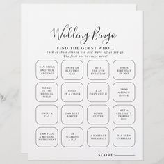 the wedding game card is shown on a marble surface