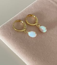 Approx 8mm x 8mm charm Hoop size 12mm x 12mm Material: Brass, Opal , cubic 18k GOLD plated Huggies.  This pair is perfect for every day wear. Can be worn in any lobe piercing, they are 18k Gold plated so can be worn everyday and keep their gorgeous gold colour and shine, longer than your standard earring.  Shipping available for International orders * Shipped same/next business day * All earrings come in a gift pouch ✨ * Message me if you have any questions or custom requests 💕 Gold Minimalist Jewelry, Lobe Piercing, Orders Shipped, Gold Colour, Gift Pouch, Opal Earrings, Huggie Hoop Earrings, Gold Plated Earrings, Pretty Jewellery