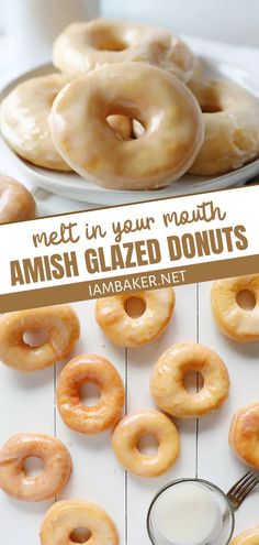 glazed donuts are sitting on a plate with a glass of milk next to them