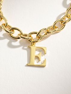 You’ll be unforgettable in this gold initial bracelet. Crafted from a gold chain bracelet and an initial pendant, our Remember Me Bracelet deserves a spot in your jewelry collection. For a fully personalized look, shop our Initial Jewelry Collection. | Gold Initial Remember Me Chain Bracelet with Letter E | Women's Jewelry by Uncommon James Initial Bracelet Gold, Initial Jewelry, Gold Initial, Gold Bracelet Chain, Initial Bracelet, Initial Pendant, Jewelry Cleaner, Cleaning Jewelry, Initial Necklace