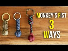 three different types of key chains on a wooden surface with the words monkey's fist 3 ways