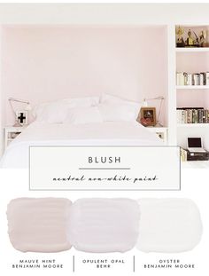 a white bed sitting next to a book shelf filled with books