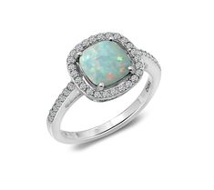 Maybe you're an October baby. Or maybe you're simply enamored with the shimmering beauty of opals. Either way, we think you're going to love this opal ring that's accented with a sprinkling of dazzling cubic zirconia Diamonique simulated diamonds. Fine Jewelry Opal Promise Ring, Opal Birthstone Promise Ring, Opal Ring With Diamond Accents For Gift, Gift Opal Ring With Diamond Accents, Anniversary Opal Ring With Accent Stones, Opal Promise Ring With Center Stone, Opal Promise Ring With Diamond Accents, Opal Ring With Gemstone Accents For Anniversary, Adjustable Opal Ring With Accent Stones For Anniversary