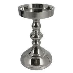 a metal candle holder on a white background