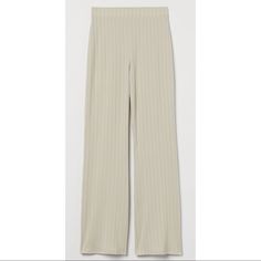 Wide-Cut Pants In Wide Ribbed Jersey.. Covered Elastic At Waistband With Straight Legs.. **Brand New** Smoke Free & Pet Free Home Materials Rayon 29% Polyester 66% Spandex 5% Fitted Wide-leg Ribbed Pants, Fitted Ribbed Wide-leg Pants, Spring Ribbed Elastane Bottoms, High Waist Beige Ribbed Bottoms, High Waist Ribbed Beige Bottoms, Spring Ribbed Trousers, Spring Ribbed Elastane Pants, Fitted Ribbed Trousers, Ribbed Fitted Trousers