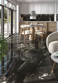 a modern kitchen with marble floors and walls