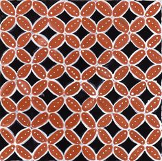 an orange and white tile pattern with dots on the bottom, in different sizes and shapes