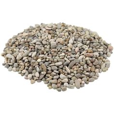 a pile of gravel on top of a white surface with no one in it's photo