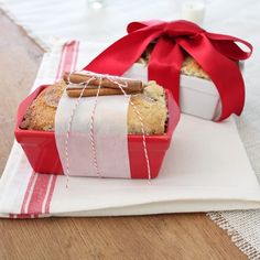 two cakes wrapped in red and white paper