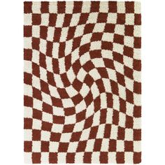 a brown and white rug with an abstract design