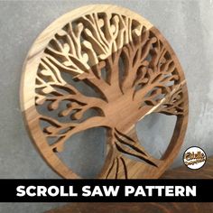 a wooden carving of a tree with the words scroll saw pattern on it's side