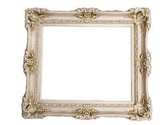 an ornate white frame with gold trimmings on the edges and a decorative design