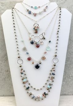 Similar to our favorite Zina necklace, this one is classic and lovely on its own. This versatile staple is also striking layered over or under a variety of other styles to create a customized dramatic look. Featuring soft shades of Labradorite, Marsala Qz, Tea Topaz, and Dark Ocean Blue Topaz colors. Length: 18-20″ (can request up to 24″ as well, no extra charge) ﻿Looking for layering options? Our layering recommendations: Harper Druzy Gemstone Bar Necklace Erica Oval Layering Necklace Looking f Dark Ocean Blue, Gemstone Bar Necklace, Dark Ocean, Glass Beads Necklace, Etsy Inspiration, Beaded Necklace Patterns, Necklace Ideas, Topaz Color, Necklace Patterns