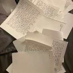 several pieces of paper with writing on them