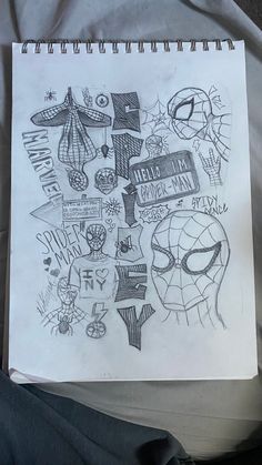 a drawing of spiderman and other things on paper