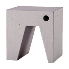 a concrete object with a hole in the middle that has been cut out to form a letter