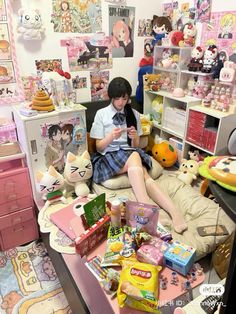 a woman sitting on top of a bed surrounded by stuffed animals and other stuff items