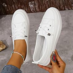 Category:Sneakers; Upper Materials:Canvas; Season:Fall,Summer,Spring; Heel Type:Flat Heel; Gender:Women's; Activity:Walking; Toe Shape:Round Toe; Style:Minimalism,Fashion,Casual,Sporty; Heel Height(inch):<1; Outsole Materials:MD (Phylon); Occasion:Outdoor,Daily; Closure Type:Lace-up; Listing Date:11/22/2023; 2024 Trends:White Shoes; Size chart date source:Provided by Supplier. White Flat Heel Slip-on Sneakers, Casual White Flat Heel Canvas Shoes, Casual White Canvas Shoes With Flat Heel, Casual White Sneakers With Flat Bottom, White Casual Flat Bottom Sneakers, White Spring Sneakers, White Casual Flat Canvas Shoes, Flat Canvas Shoes With Laces For Spring, Spring Flat Canvas Shoes With Laces