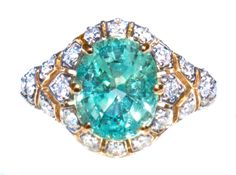 "To view a video of this amazing ring, please go to: https://www.youtube.com/watch?v=a1GxwXfrSfQ Please be wary of 'lab grown' and 'cultured' Paraiba gemstones! They are synthetic, and are never worth more than a few dollars. This is a natural, 'mined' Paraiba. In gemology, Paraiba Tourmalines are copper-bearing and only Tourmalines. We've seen shops selling \"Paraiba spinels\". There are no such things. These are lab grown and called by the GIA 'synthetic'. They are worthless This is one of the Birthday October, Paraiba Tourmaline Ring, Ruby Fuchsite, Handmade Jewelry Ring, Paraiba Tourmaline, Tourmaline Jewelry, Colorless Diamond, Tourmaline Ring, 925 Silver Rings