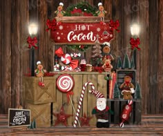 a christmas display with candy canes, candies and other holiday decorations on wooden planks