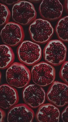 the pomegranates are cut in half and placed on top of each other