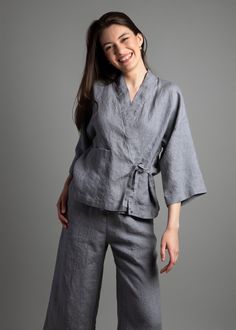 "MADE TO ORDER - Stay cozy and chic with this elegant light kimono linen jacket that exudes effortless style. Made from premium quality lightweight linen fabric, this jacket is perfect for any season. Its loose-fitting kimono style ensures maximum comfort and breathability, making it the go-to choice for any casual or formal outing. Featuring a tasteful design and a smooth silhouette, this jacket is sure to elevate your wardrobe to new heights. Shown in Beige Blue  Melange 100% medium weight lin Kimono Jacket Modern, Casual Linen Kimono For Loungewear, Casual Linen Kimono With Relaxed Fit, Casual Linen Kimono With Kimono Sleeves, Linen Uniform, Casual Linen Kimono For Spring, Spring Casual Linen Kimono, Spring Linen Outerwear With Kimono Sleeves, Spring Linen Kimono