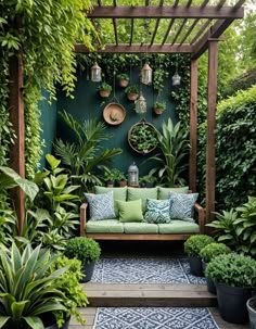 an outdoor seating area with potted plants and greenery