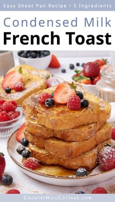 a stack of french toast with berries and powdered sugar on top, sitting on a plate