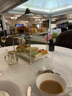 Tray of tea sandwiches and small dessert cookies. Tea and champagne are featured. Harrods Tea Room, Room London, London Travel, Tea Room, Harrods, Girls Night, Cuba, London, Tea