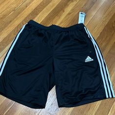 Adidas 3 Stripe Shorts With Zip Front Pockets Casual Black Athletic Shorts With Three Stripes, Adidas Black Athletic Shorts With Built-in Shorts, Black Athletic Shorts With Three Stripes, Adidas Casual Black Bottoms, Black Striped Athletic Shorts, Sporty Short Black Pants, Adidas Black Shorts With Built-in Shorts, Adidas Black 2-in-1 Shorts, Adidas Black Shorts