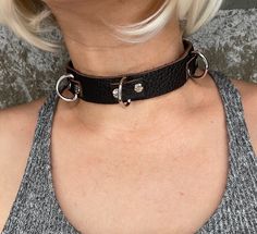 Buffalo leather 3 D ring choker  Handmade leather  Three D rings  Six hand pressed rivets  Measurements ::  1 inch wide // 14 - 16  inches long  Very durable and thick leather  Medium weight  Two sturdy snaps to close and adjust sizing  Very versatile and unique // high quality  Made in California Edgy Leather Choker Jewelry, Edgy Leather Choker, Punk Choker, Choker Handmade, Leather Choker Necklace, Leather Chokers, Buffalo Leather, Choker Necklaces, Leather Necklace