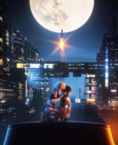 a man and woman kissing in front of a city at night with the moon behind them