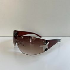 Y2k 2000s Vintage Style Brown Frameless Star Sunglasses Brown Frame With A Tea Brown Tinted Frameless Lens These Glasses Are Unisex :)! Uva Uvb Protection Brand New #Sunglasses #Shades #Sunnies #Fashion 2000s Sun Glasses, Early 2000s Glasses, Tinted Glasses Aesthetic, Brown Sunglasses Aesthetic, Vintage Sunglasses Aesthetic, 2000 Glasses, Y2k Sunnies, Shades Aesthetic, Y2k Shades