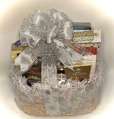 a gift basket filled with chocolates, candy and other items for someone's special occasion