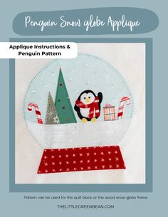 the penguin snow globe applique is shown with an image of a penguin and christmas tree