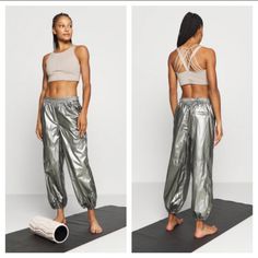 Nwot Free People Mirror Ball Sweatpants Get Moving In These Eye-Catching Warmup Pants Featured In A Shiny Metallic Design With A Slouchy Silhouette And Cinched Ankles Cool Athleisure Track Pants With A Paneled Design And Coated Finish. Elasticized Waist Side Pockets Back Welt Pocket Elasticized Cuffs Coated Nylon Rise, About 11" Inseam, About 25" Leg Opening, About 10" 47% Nylon, 45% Polyester, 8% Spandex New Without Tags B30 Stretch Parachute Lounge Pants, Stretch Parachute Pants For Loungewear, Bright Pink Hair, Short Faux Fur Jacket, Metallic Design, Nike Acg Jacket, Leopard Print Jacket, Mirror Ball, Printed Joggers