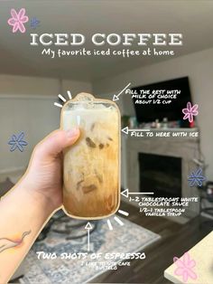 someone is holding up a iced coffee in their hand with instructions on how to use it