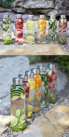 several bottles filled with different types of fruits and vegetables in them, all lined up next to each other